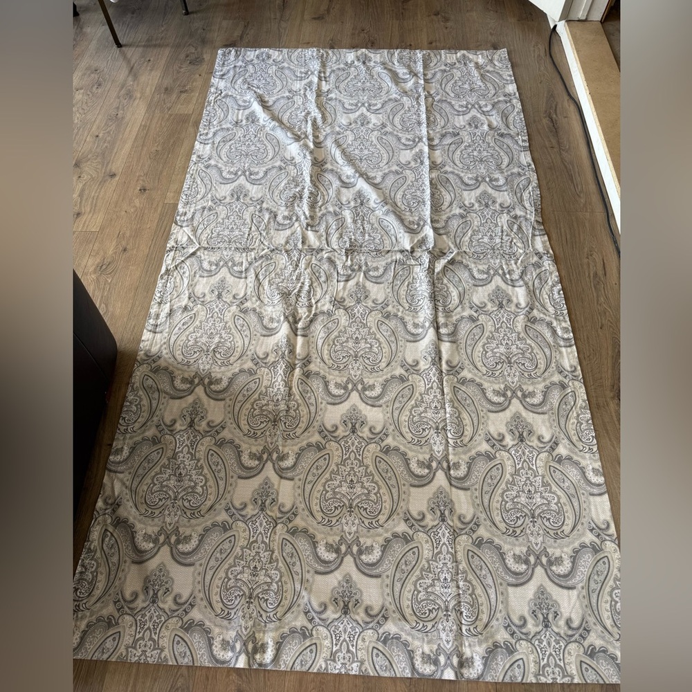 Four Paisley Patterned Window Treatments.
